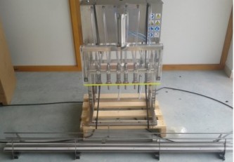 Poloautomatickú plnička fliaš ES1200 - image